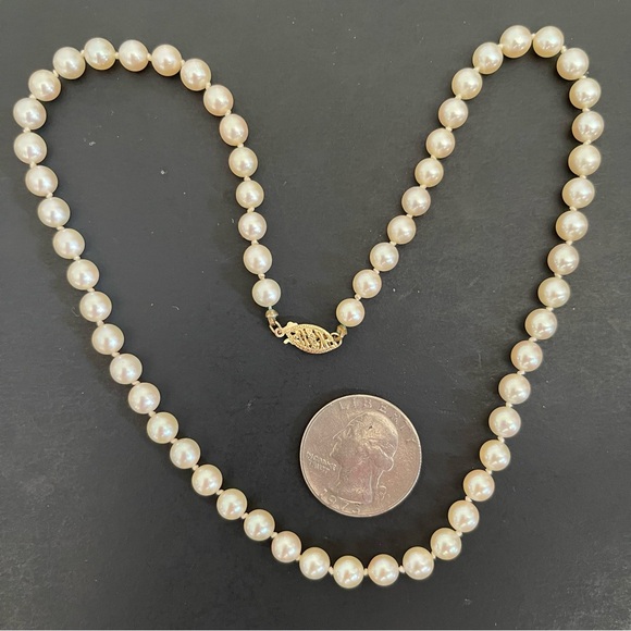 Elegant 14KT yellow gold genuine Japanese salt water Pearl Necklace.